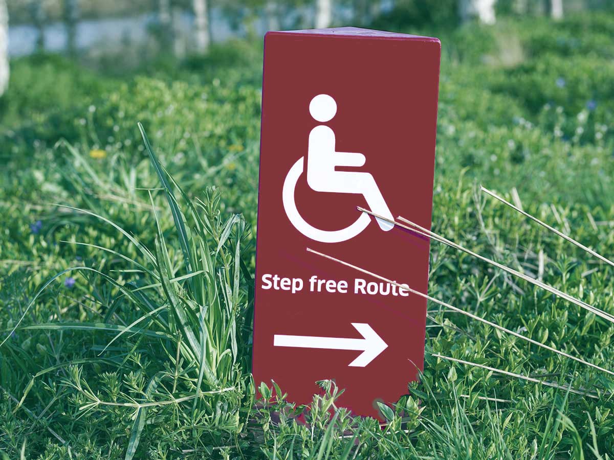 Sign showing route to wheelchair access